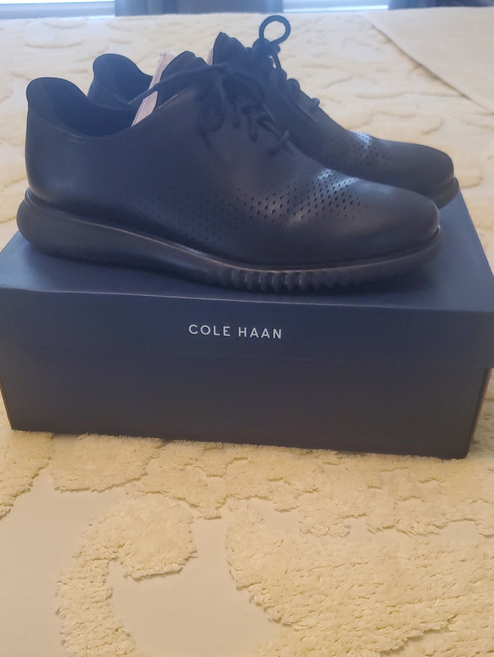 Cole Haan Black Perforated Leather Derby Sneakers with Lace-Up Closure